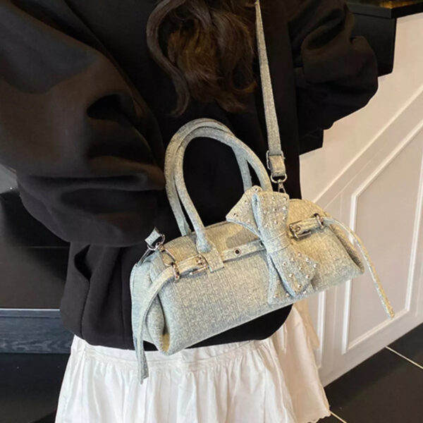 02a5d879-c92b-4a27-9d1a-bc01f1a9b986-Max-Origin.jpg Denim Bow Accent Crossbody Bag