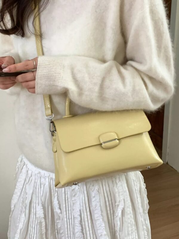 0c75c0f1-75c0-4169-bf62-b421151a6611-Max-Origin.jpg Top-Handle Crossbody Bag