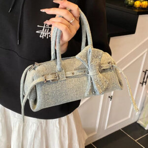 137aad55-0414-4727-8a03-da219f5c0331-Max-Origin.jpg Denim Bow Accent Crossbody Bag