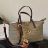 1dde1390-4722-4c00-b421-62ed3b6e4337-Max-Origin.jpg Woven Crossbody Bag with Gold Chain Accents