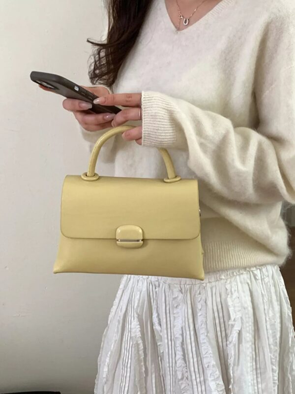 27b56f5b-1810-4bc7-abba-7dfb5aee468a-Max-Origin.jpg Top-Handle Crossbody Bag