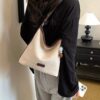 3295d249-ea0e-46e7-93ca-5b8ee319aa3f-Max-Origin.jpg Casual Shoulder Bag with Decorative Charm