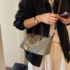 360ffc36-107c-487b-8ed9-90165985de7e-Max-Origin.jpg Woven Crossbody Bag with Gold Chain Accents