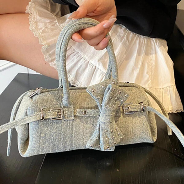 3c43f2fc-495c-4e53-8b5e-98aed7654811-Max-Origin.jpg Denim Bow Accent Crossbody Bag
