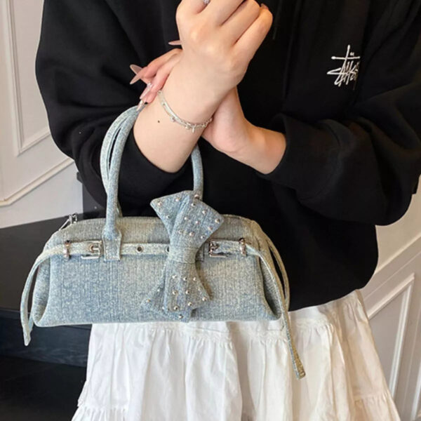 635bc26d-f1b7-442b-9d41-63e251833003-Max-Origin.jpg Denim Bow Accent Crossbody Bag