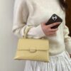 8ef940d7-e92c-4c54-96da-cc997885e7fc-Max-Origin.jpg Top-Handle Crossbody Bag
