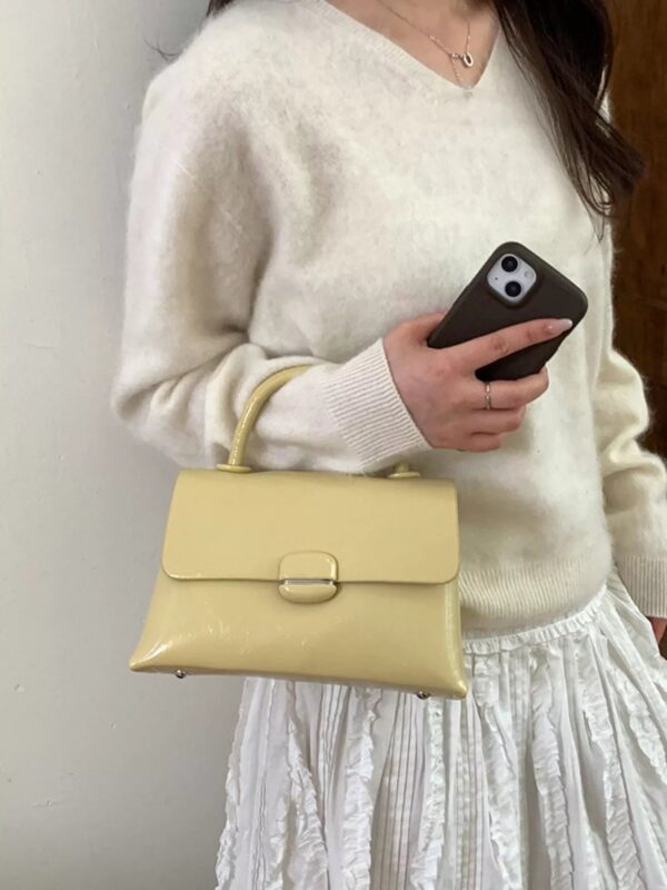8ef940d7-e92c-4c54-96da-cc997885e7fc-Max-Origin.jpg Top-Handle Crossbody Bag