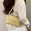 b7a5669f-119e-421f-ae92-638cb981a1f6-Max-Origin.jpg Top-Handle Crossbody Bag