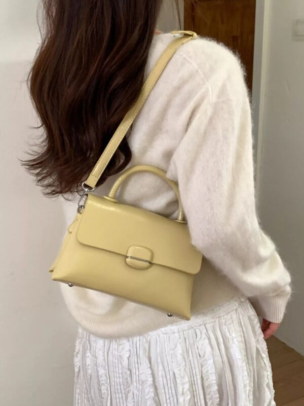 b7a5669f-119e-421f-ae92-638cb981a1f6-Max-Origin.jpg Top-Handle Crossbody Bag