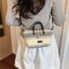 cb95935b-0a63-47ac-91c5-147441510c95-Max-Origin.jpg Striped Canvas Crossbody Bag