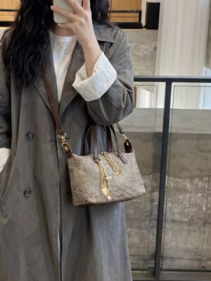 d72f9ce8-9c02-4ba4-b9a7-0187318493dc-Max-Origin.jpg Woven Crossbody Bag with Gold Chain Accents