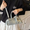 dbd327b4-94e6-4e3b-9ec2-9d92025a76a4-Max-Origin.jpg Denim Bow Accent Crossbody Bag