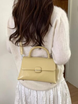 eb7ef96f-d3f1-41f0-bc95-ee8a1dbc481e-Max-Origin.jpg Top-Handle Crossbody Bag