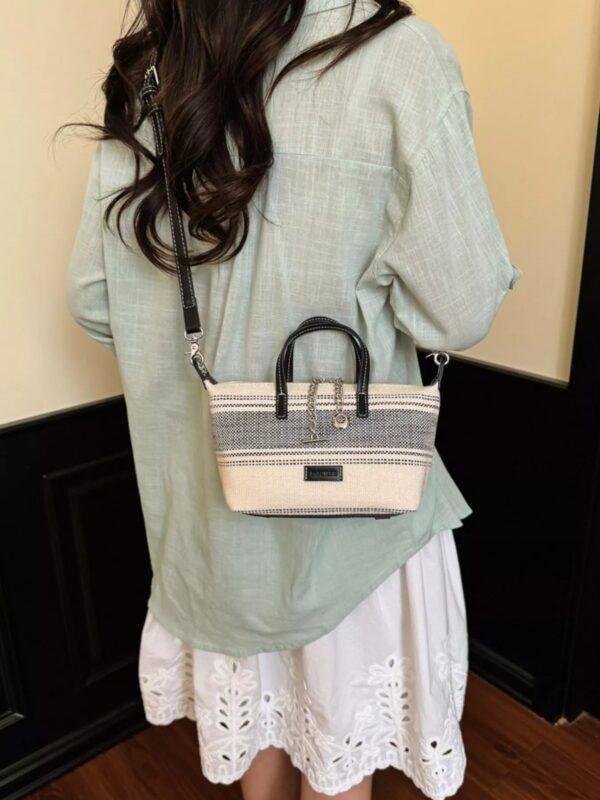 f5262d67-434a-4e15-af04-ba5784c1327b-Max-Origin.jpg Striped Canvas Crossbody Bag